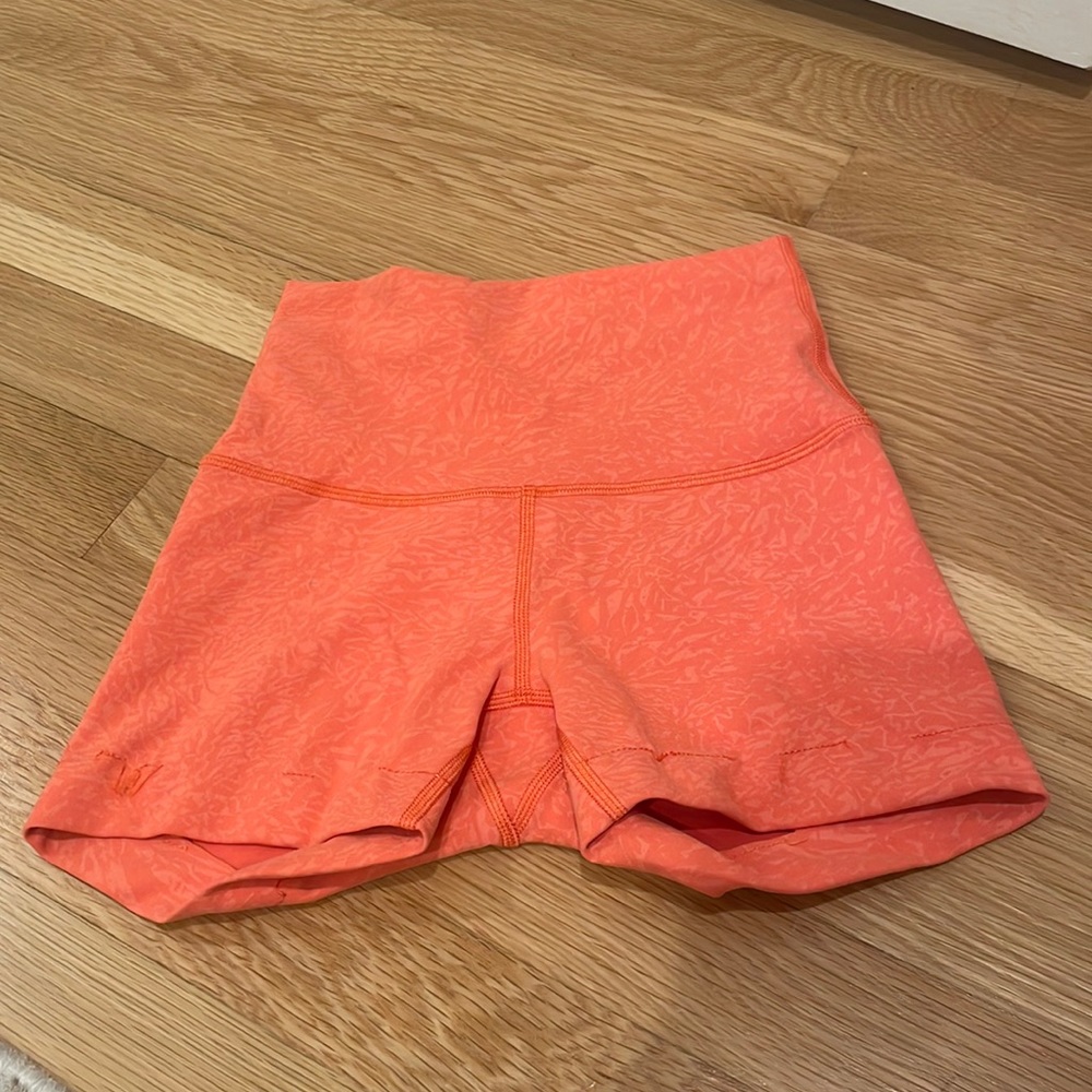 lululemon orange biker shorts size zero, hemmed to four inch